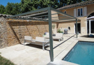 Pergola terrasse moderne, design variante entre bâche et câble tendu proche Villefranche-sur-Saône (69)